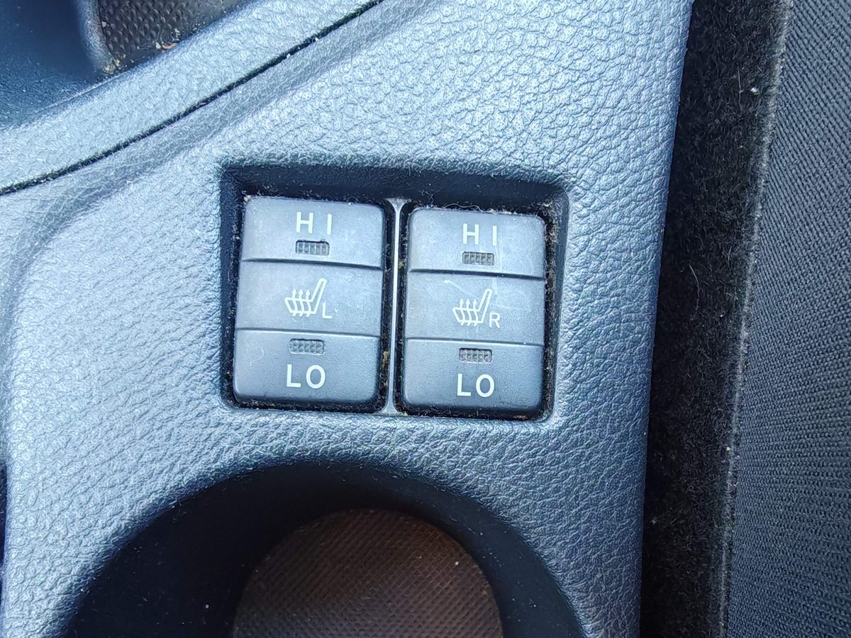 Heated seat buttons